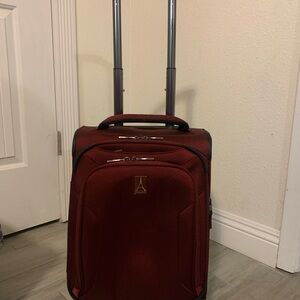 Travelpro Burgundy Rolling Carry on